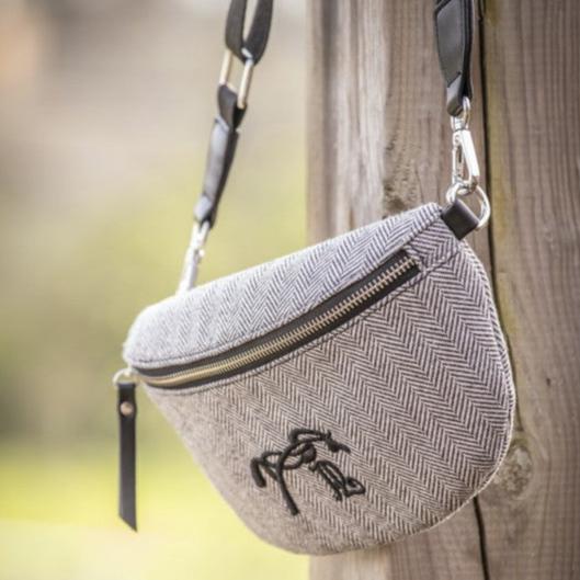 Penelope Chevron Fanny Pack with stylish chevron pattern and adjustable removable shoulder strap.