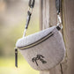 Penelope Chevron Fanny Pack with stylish chevron pattern and adjustable removable shoulder strap.