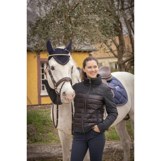 Penelope Edelweiss Jacket with lightly padded quilted body and softshell-style sleeves.