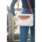 Penelope Emilie leather pouch with cognac leather, soft cream faux fur and removable crossbody strap.