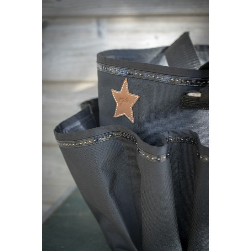 Penelope grooming bag designed for horse care supplies and brushes.