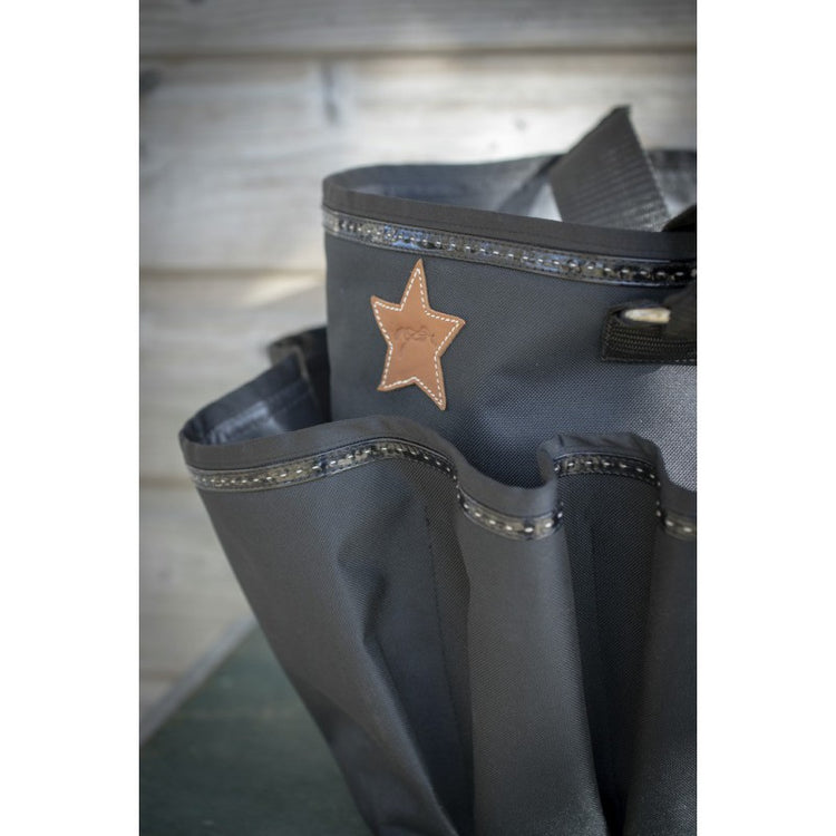 Penelope grooming bag designed for horse care supplies and brushes.
