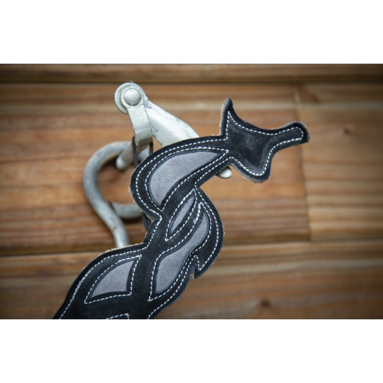 Penelope equestrian stable toy made from leather to help keep horses entertained indoors.