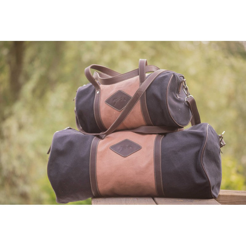 Penelope equestrian travel bag with sturdy handles and wide shoulder strap for versatile carrying.