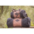 Penelope equestrian travel bag with sturdy handles and wide shoulder strap for versatile carrying.