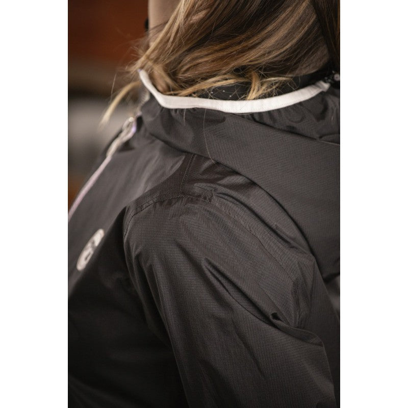 Penelope Fashion Rain coat with two-way zipper, rear riding slit and chest logo.
