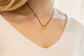 Penelope Equestrian Necklace with a gold-plated horse pendant.
