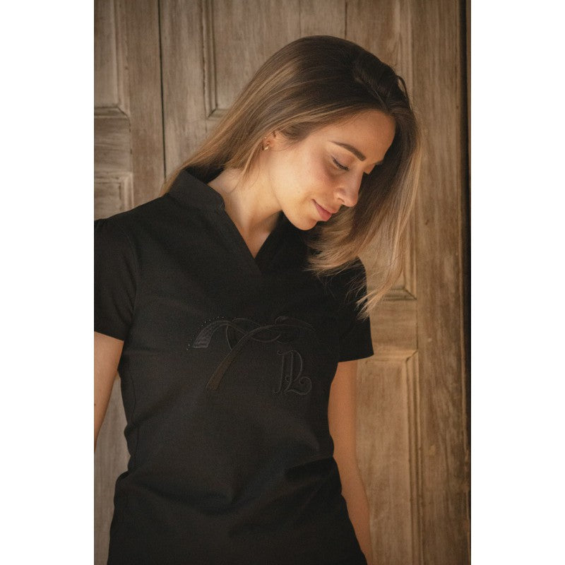 Penelope Iliana equestrian polo with sophisticated short sleeve design.