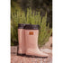 Penelope Jessica pale pink boots with durable construction and branded leather patch detail.