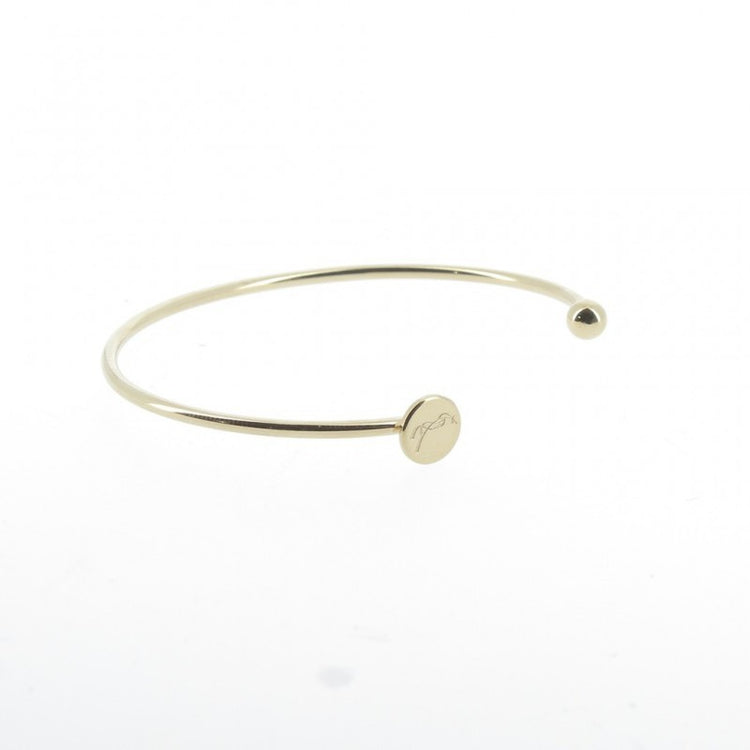 penelope Jonc Bracelet in fine gold-plated brass with signature horse detail.