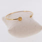 Penelope Jonc equestrian bangle with elegant half-oval shape for a comfortable fit.