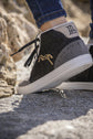 Penelope Jupiter casual sneakers with PL monogram detail on the back.