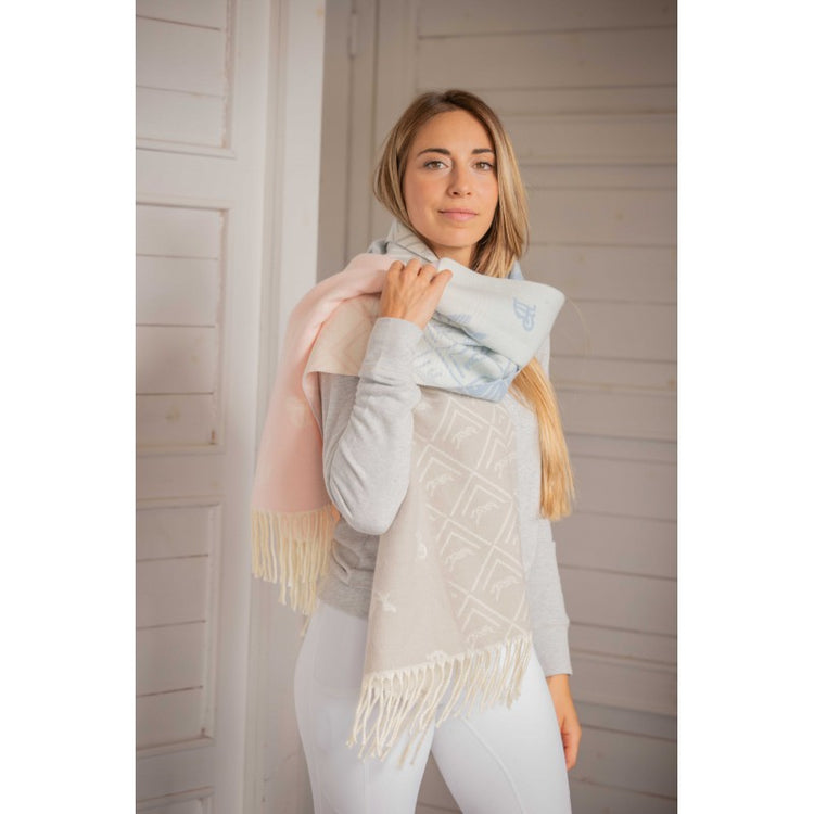 Penelope Lana Scarf in rainbow with signature patterns and elegant fringed edges.