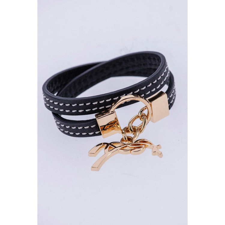 Penelope leather bracelet with signature equestrian logo detail.