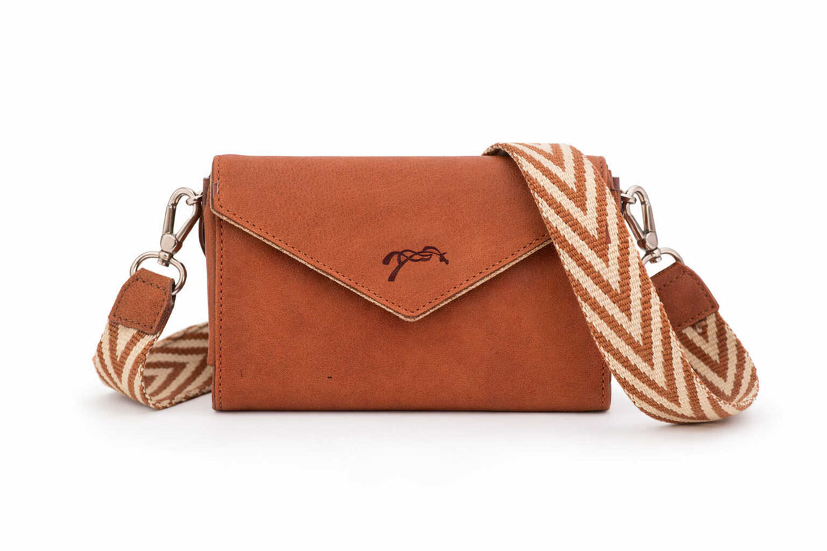 Penelope leather equestrian phone pocket designed for riding, stable work and everyday use.