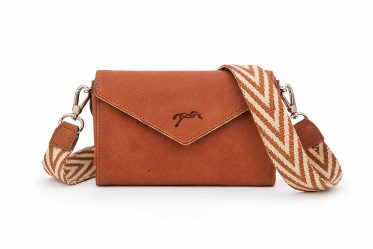 Penelope leather equestrian phone pocket designed for riding, stable work and everyday use.