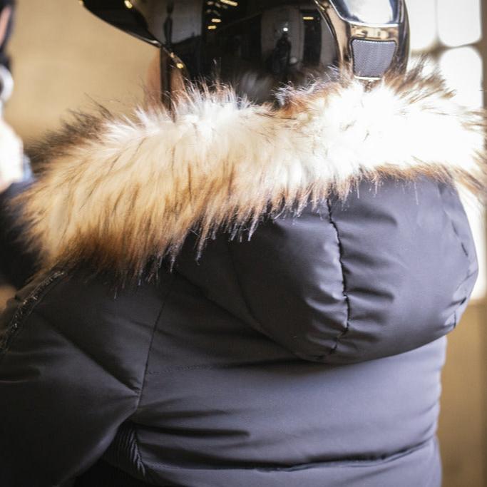 Penelope Louxy equestrian winter jacket with elastic side panels and practical zipped pockets.