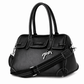 Penelope Maelys bag with decorative silver charm on the front.