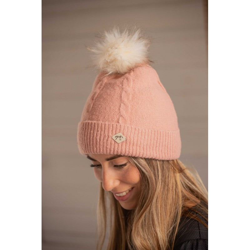 Penelope Michka fleece lined beanie with elegant cable knit design and soft pom-pom.