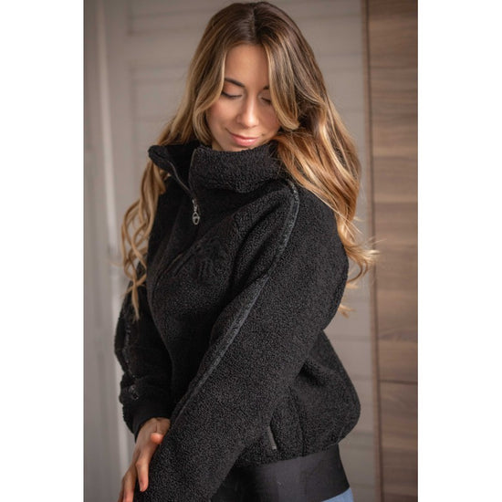 Penelope Miwi equestrian zip jacket with ultra-soft fleece, zipped pockets and branded elastic waistband.