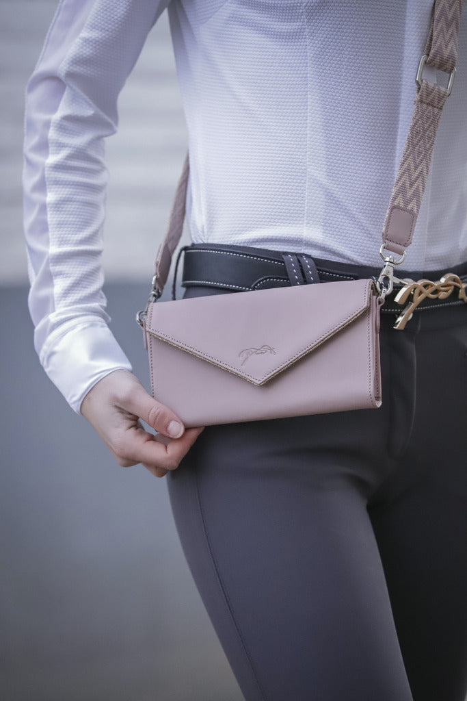Penelope Perforated Phone Pocket in cowhide leather with practical snap button belt loops.