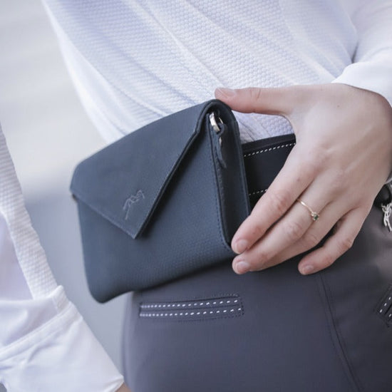 Penelope Perforated Phone Pocket for carrying a phone while horse riding.