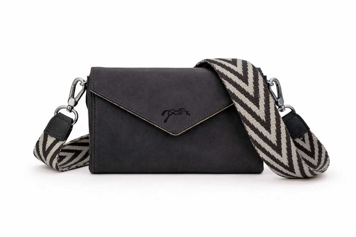 Penelope Phone Pocket with removable shoulder strap for wearing as a crossbody bag.