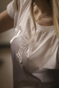 Penelope Poppy rhinestone T-shirt with a flattering feminine fit.