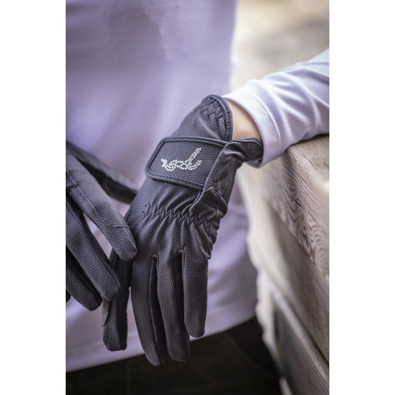 Penelope Prisma crystal logo riding gloves combining practical grip with elegant detailing.