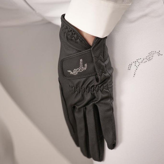 Penelope Prisma riding gloves with shiny rhinestone Penelope logo on the Velcro flap.