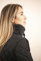 Penelope quilted equestrian jacket with subtle embroidered logo.