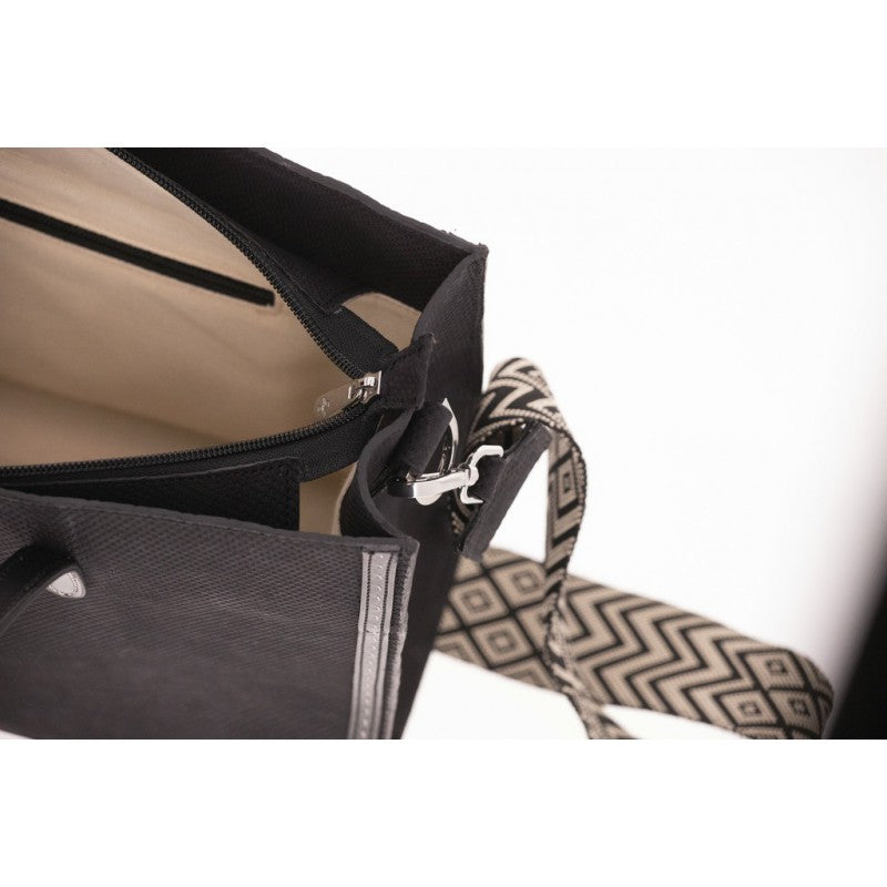 Penelope Romane crossbody handbag with practical zipped closure.