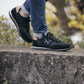 Penelope Saturne rose gold sneakers with embroidered PL monogram on the back.