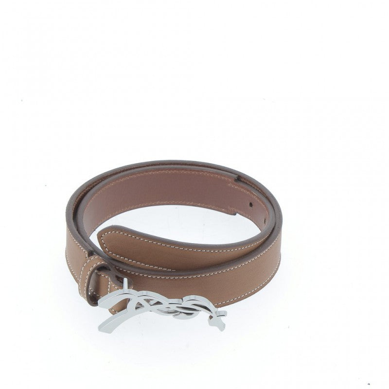 Penelope Signature leather belt with off-white contrast stitching.