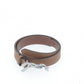 Penelope Signature leather belt with off-white contrast stitching.