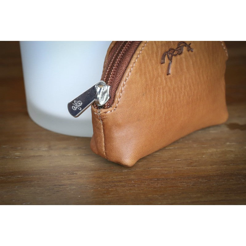 Penelope small zip wallet with stylish stitching and practical silver-tone closure.