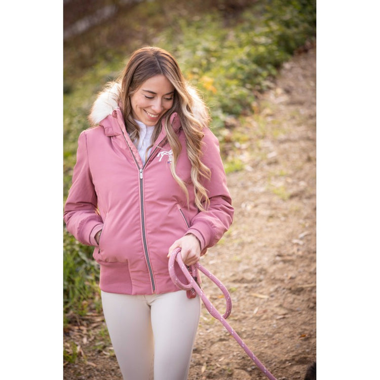 Penelope Step equestrian winter jacket with a large faux fur hood.
