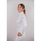 Penelope Toscane rhinestone show shirt with sky-blue sparkling logo on the upper left sleeve.