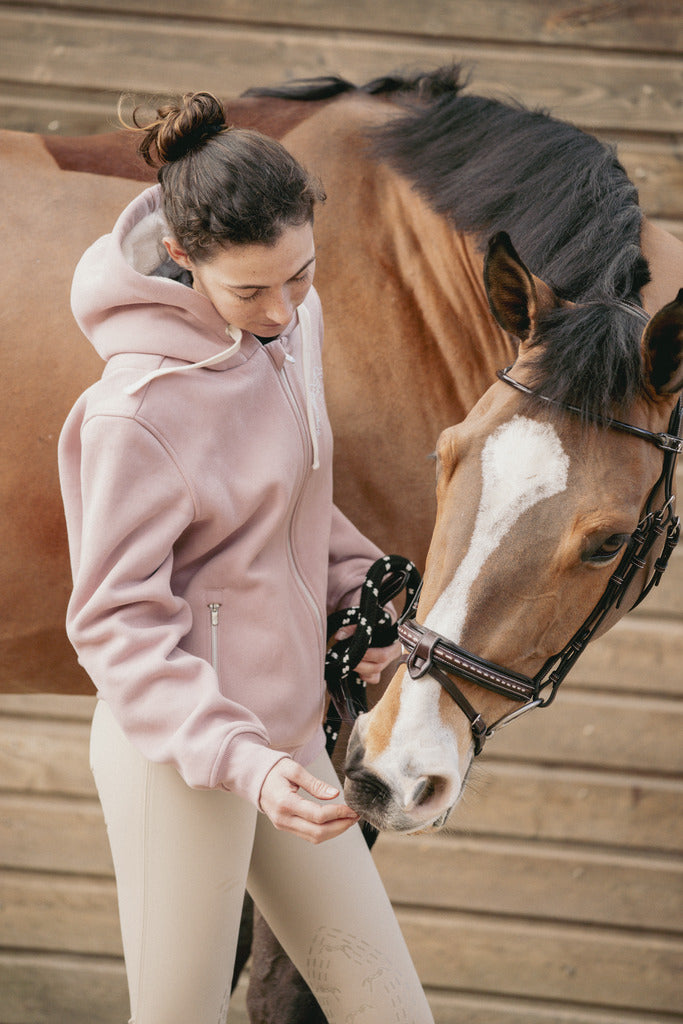 Penelope Tressy teddy fleece hoodie with large lined hood and wide drawstrings.