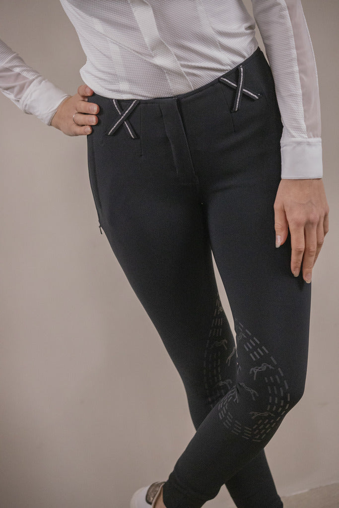 Penelope Zuri breeches with sparkling rhinestone Penelope logo on the upper thigh.