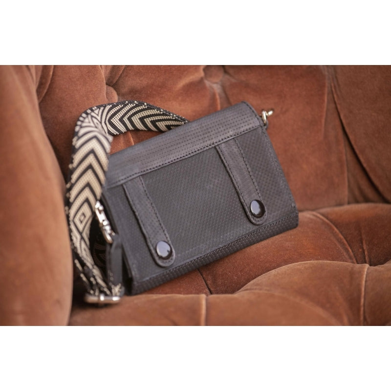 Phone bag for stable and riding with practical versatile design.