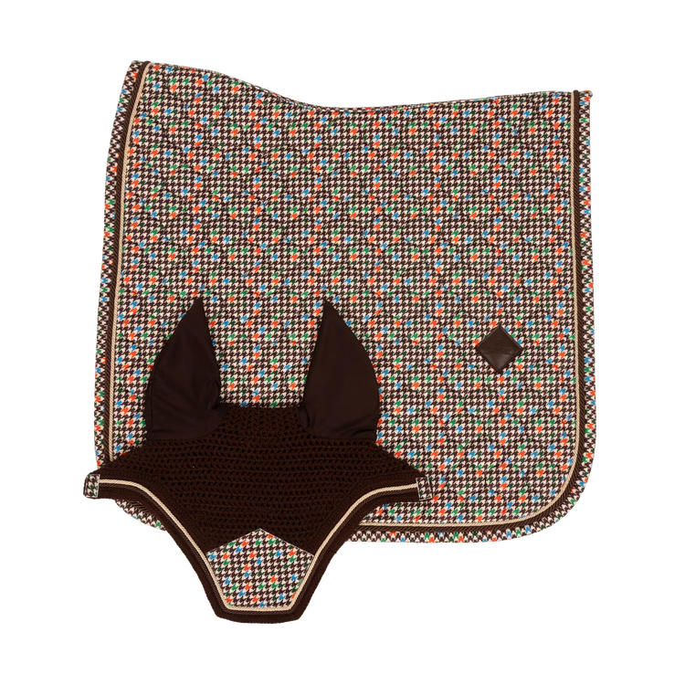 Velvet houndstooth saddle pad for dressage horses and riders.