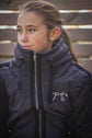 Quilted stable jacket for women with practical storage pockets.
