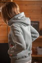 Riding hoodie with zip pockets for secure storage during training and other sporting activities.