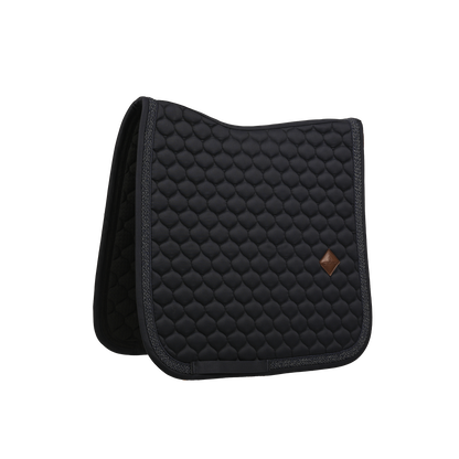Saddle pad with elegant plaited glitter rope around the edge