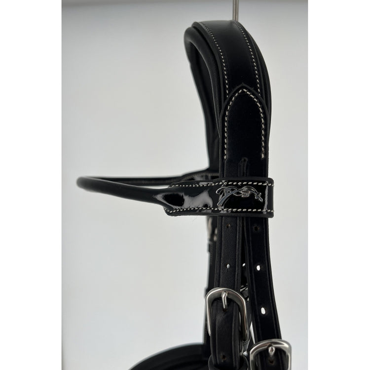 Shetland pony bridle with padded noseband and patent leather details.