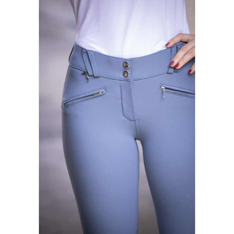 Silicone knee grip riding breeches designed to help secure the lower leg while riding.