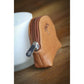 Small equestrian coin purse with a practical zip closure for everyday use.