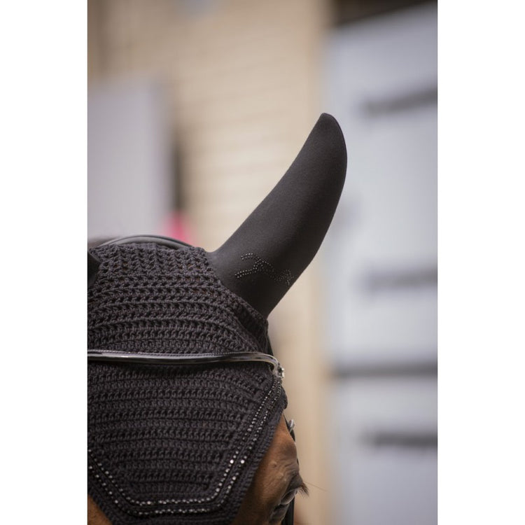 Soundless horse fly veil with flexible padded ears designed to help reduce background noise.