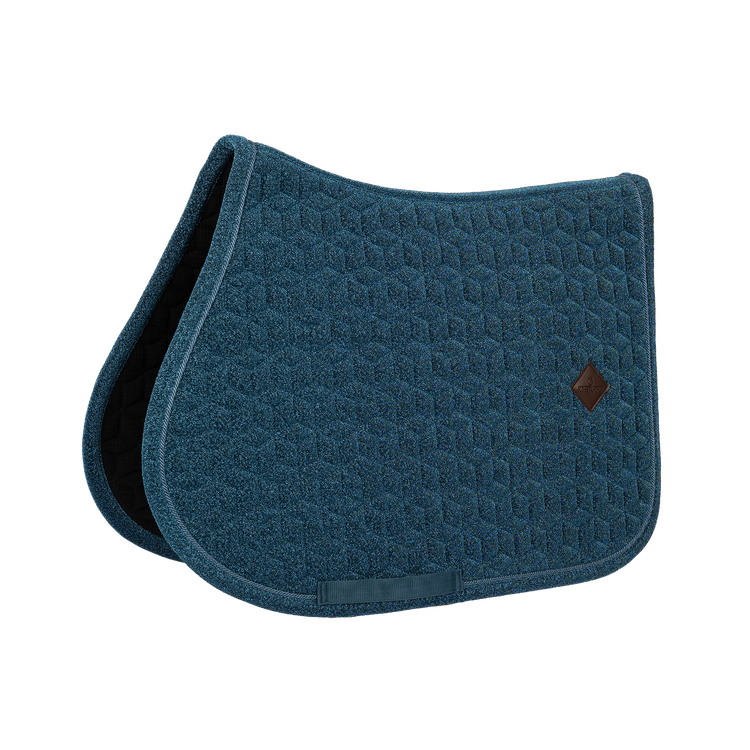 Sparkling quilted horse saddle pad designed to help protect against friction